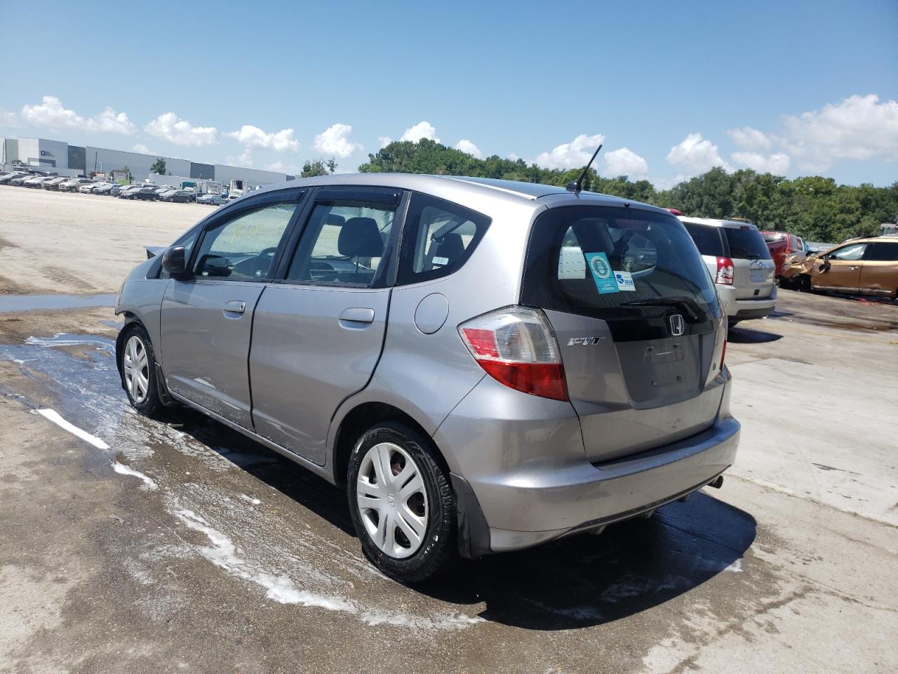 Photo 3 from auction – 2009 HONDA FIT with VIN JHMGE88249S073277