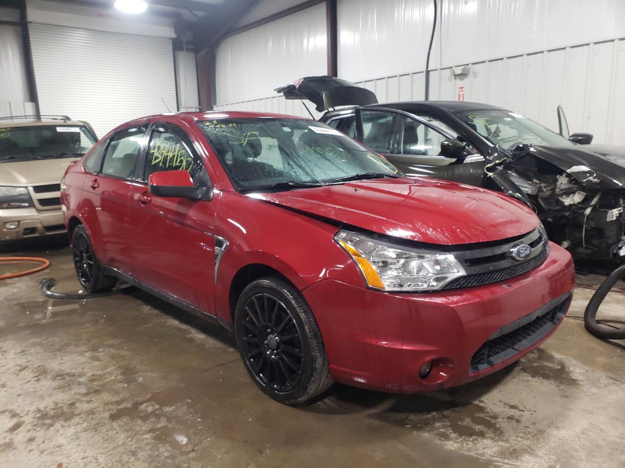 FORD FOCUS SES 2010 with VIN 1FAHP3GNXAW115114 - Photo from auction