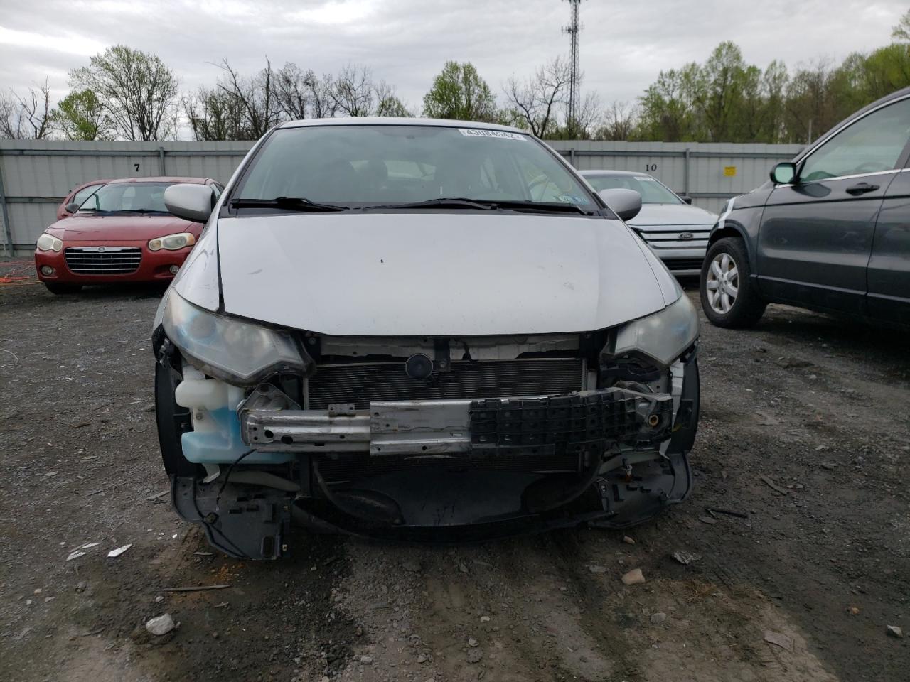 Photo 9 from auction – 2011 HONDA INSIGHT LX with VIN JHMZE2H55BS011697