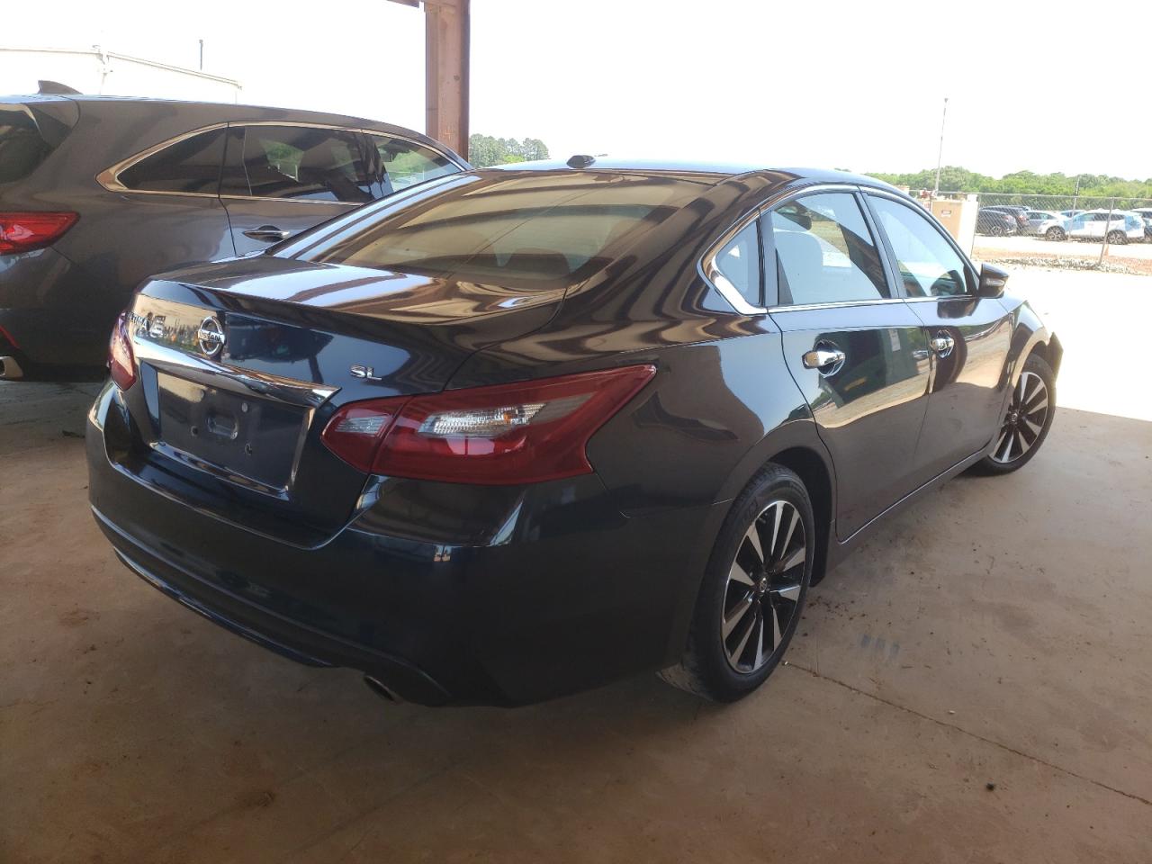 Photo 4 from auction – 2018 NISSAN ALTIMA 2.5 with VIN 1N4AL3AP3JC142390