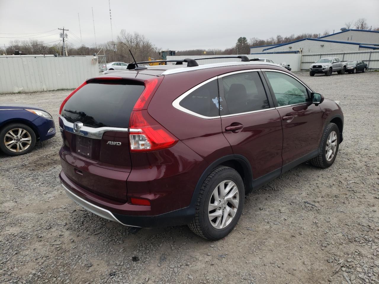 Photo 4 from auction – 2015 HONDA CR-V EXL with VIN 2HKRM4H74FH603856