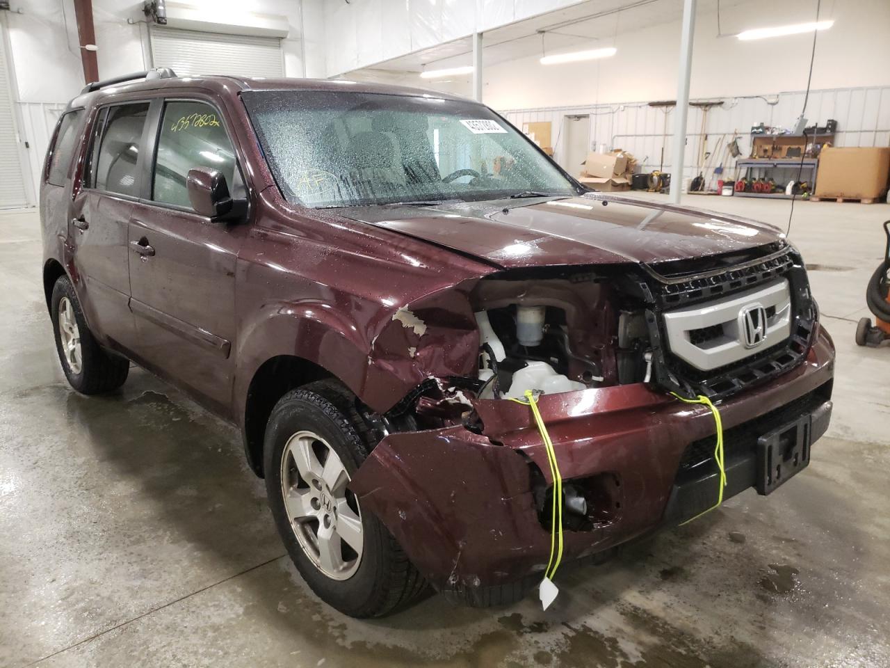 HONDA PILOT EXL 2011 with VIN 5FNYF4H58BB022261 - Photo from auction