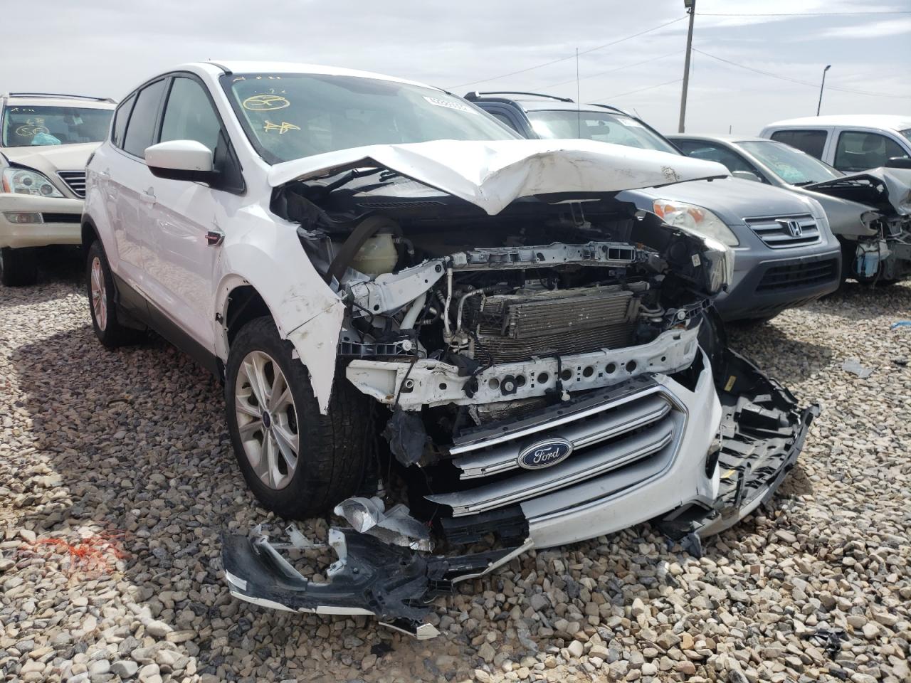 Photo 1 from auction – 2017 FORD ESCAPE SE with VIN 1FMCU9GD5HUE39323