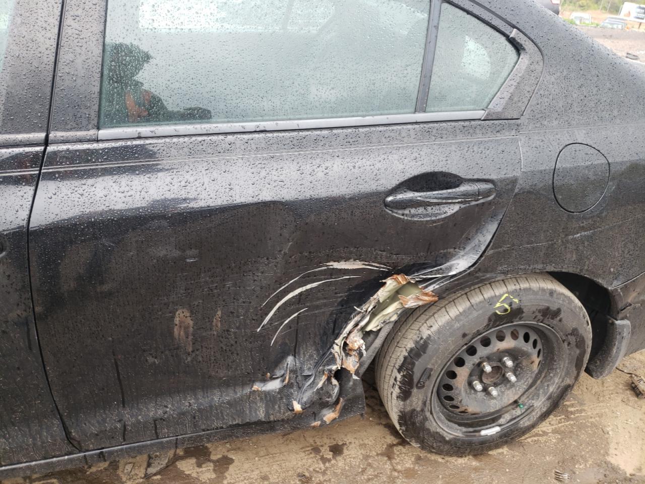Photo 9 from auction – 2014 HONDA CIVIC LX with VIN 2HGFB2F53EH508521