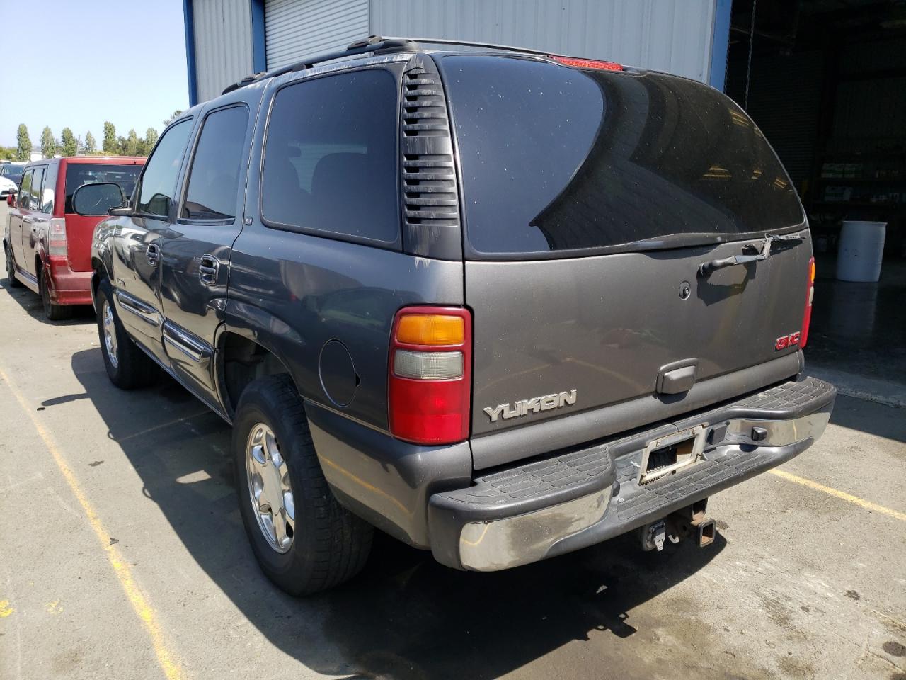 Photo 3 from auction – 2002 GMC YUKON with VIN 1GKEC13V22J277454