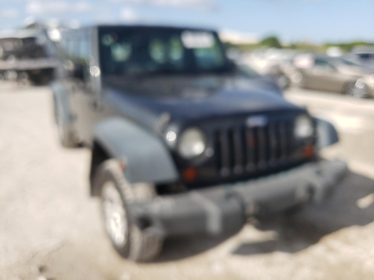 JEEP WRANGLER U 2010 with VIN 1J4BZ3H19AL136344 - Photo from auction