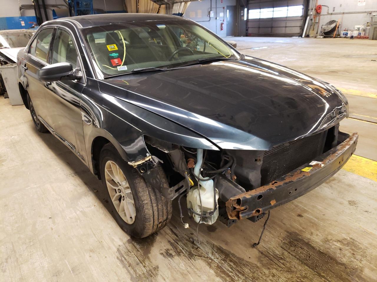 FORD TAURUS SE 2014 with VIN 1FAHP2D88EG125245 - Photo from auction