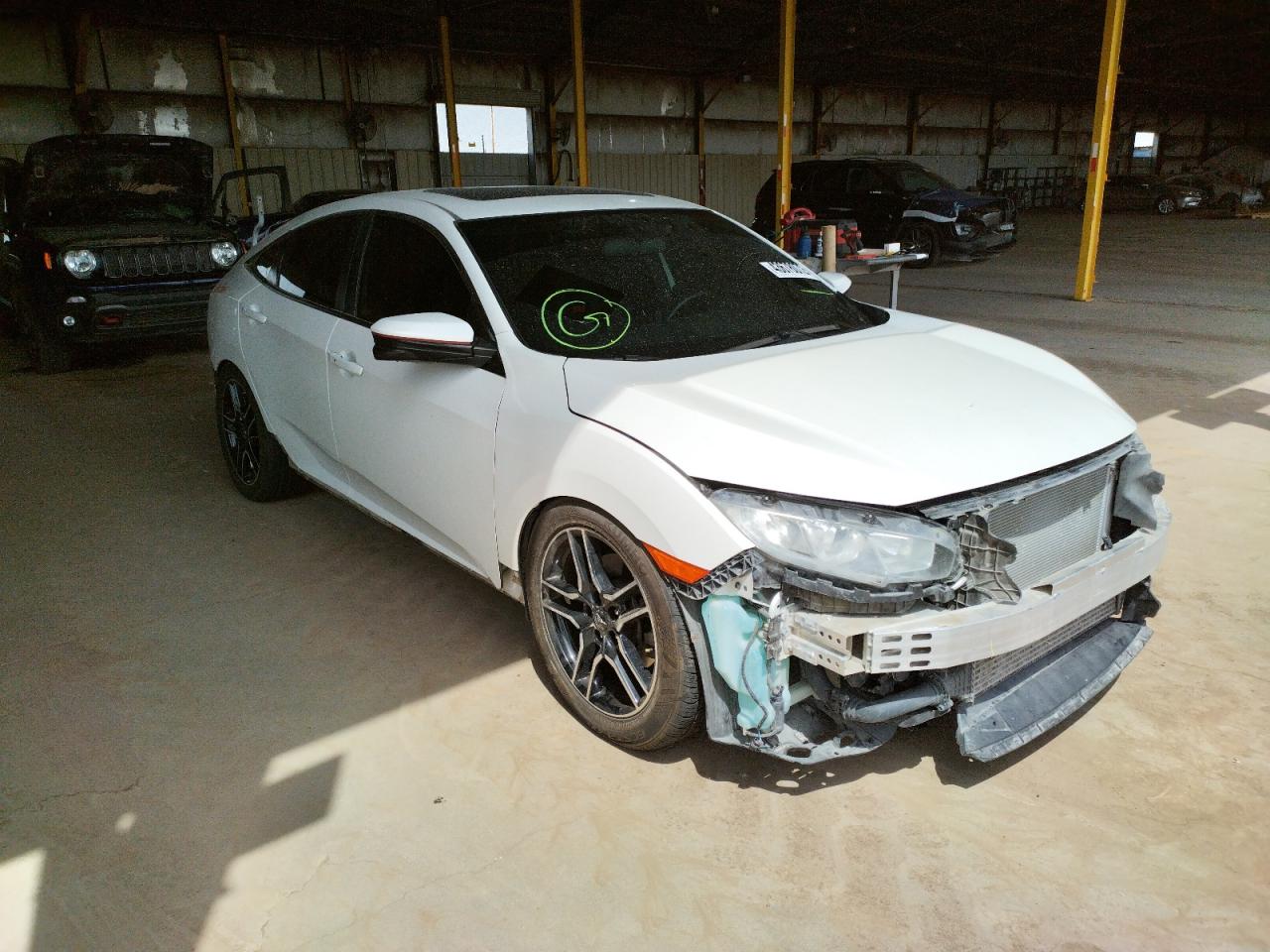HONDA CIVIC SI 2017 with VIN 2HGFC1E54HH702729 - Photo from auction