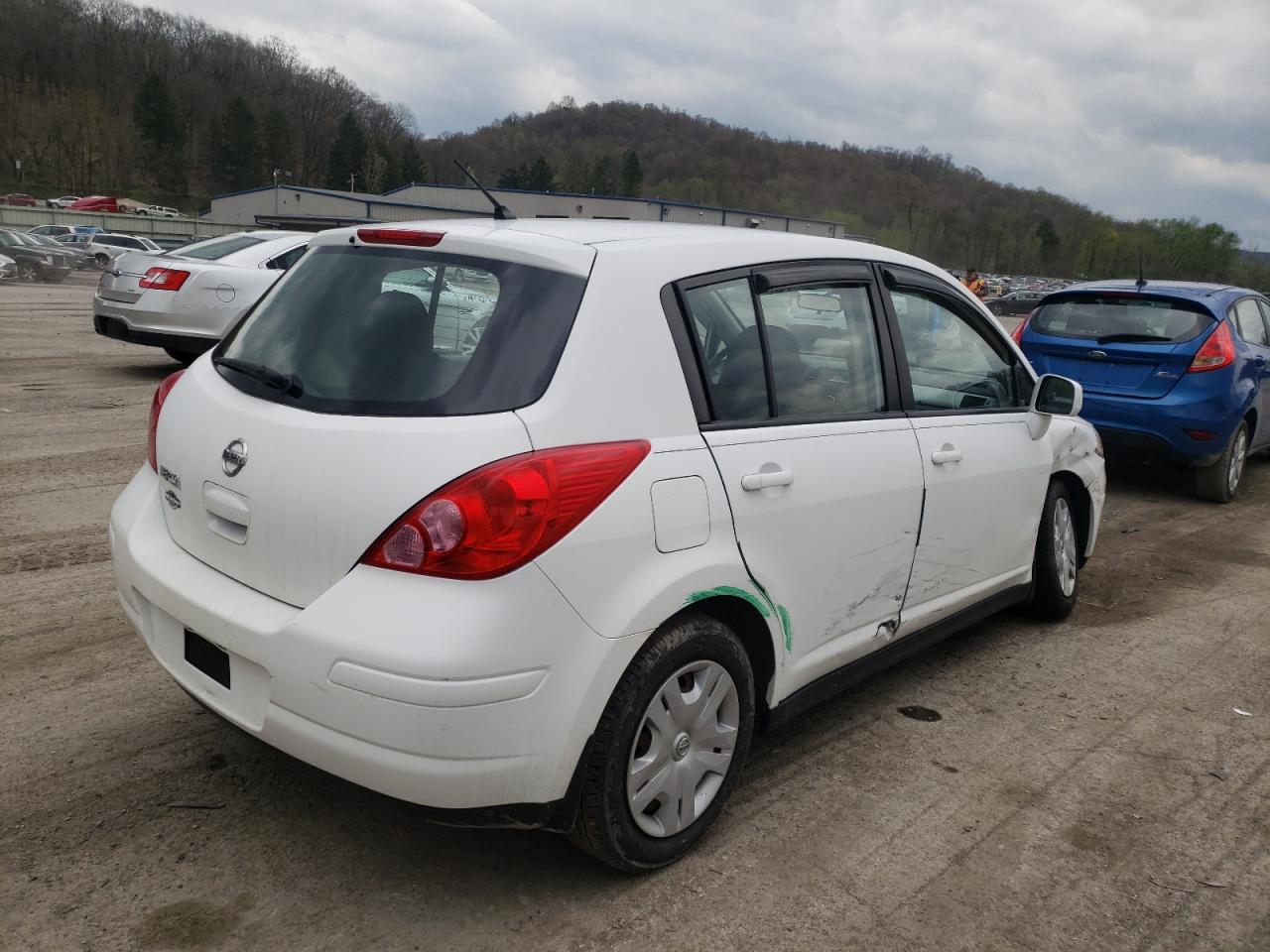 Photo 4 from auction – 2011 NISSAN VERSA S with VIN 3N1BC1CP4BL431142