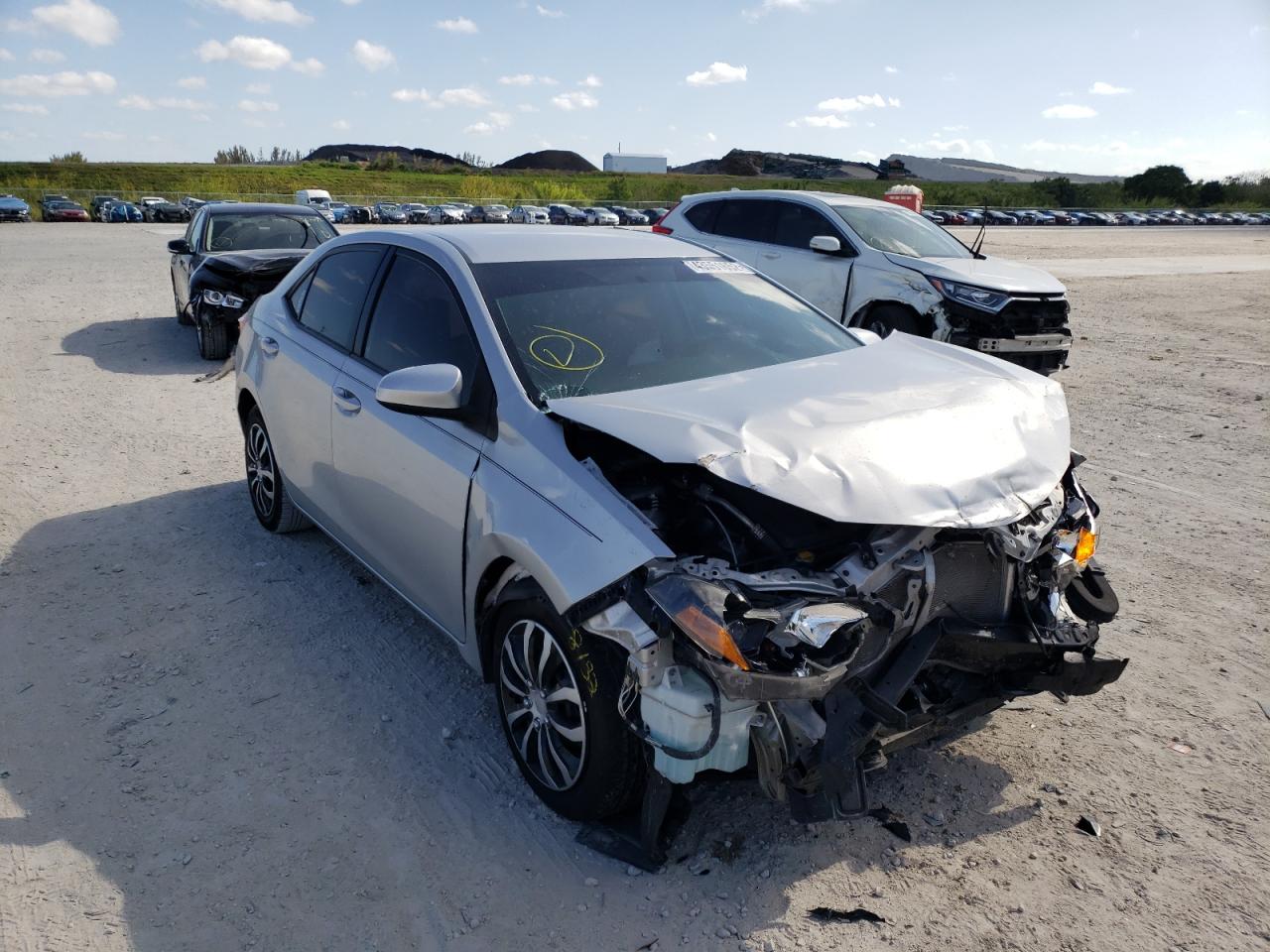TOYOTA COROLLA L 2016 with VIN 5YFBURHE5GP557486 - Photo from auction