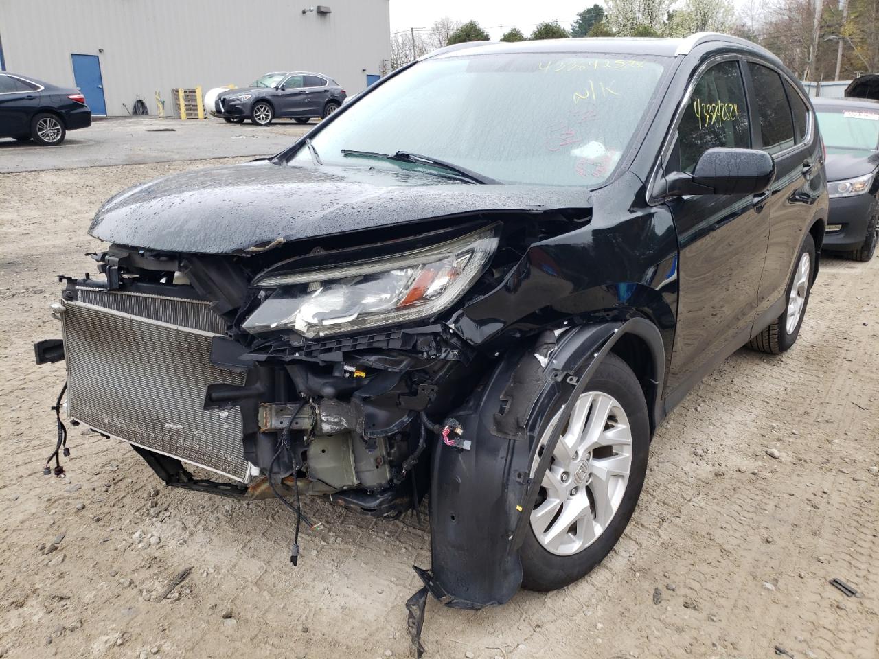 Photo 2 from auction – 2016 HONDA CR-V EXL with VIN 2HKRM4H75GH659662
