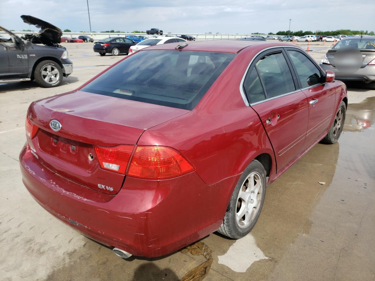 Photo 4 from auction – 2009 KIA OPTIMA LX with VIN KNAGE224995337968