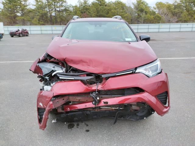 Photo 9 from auction – 2018 TOYOTA RAV4 LE with VIN 2T3BFREV7JW743963