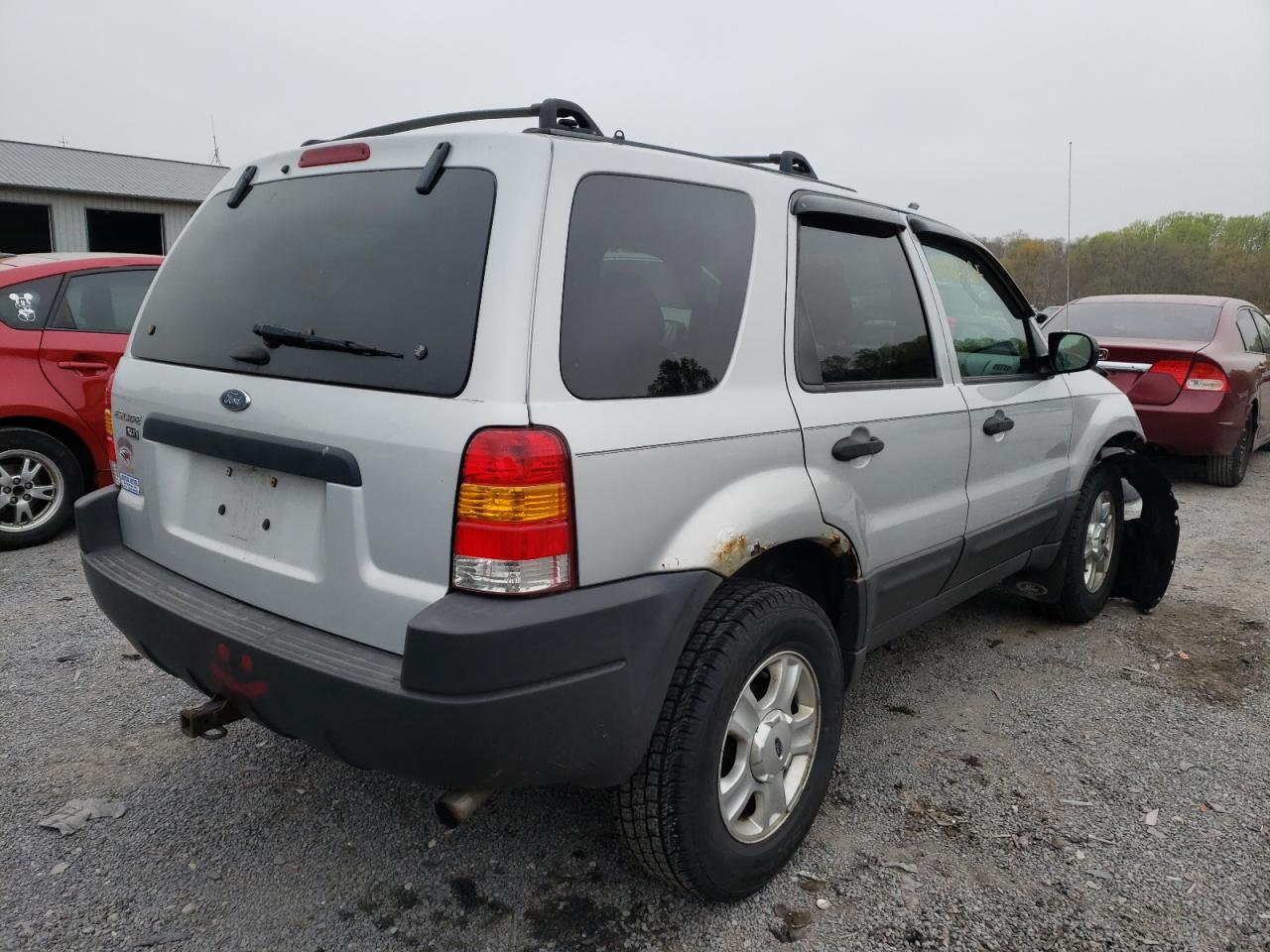 Photo 4 from auction – 2003 FORD ESCAPE XLT with VIN 1FMYU931X3KB34597