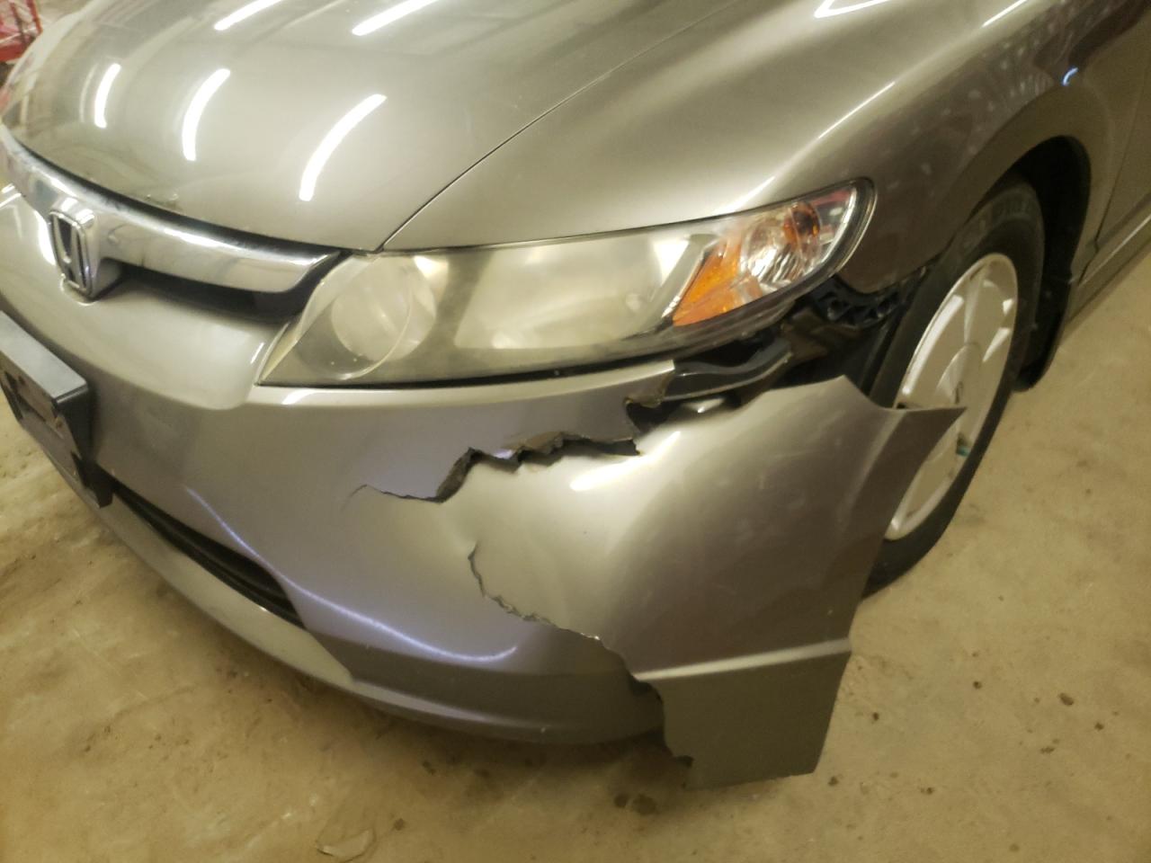 Photo 9 from auction – 2007 HONDA CIVIC HYBR with VIN JHMFA36267S002866