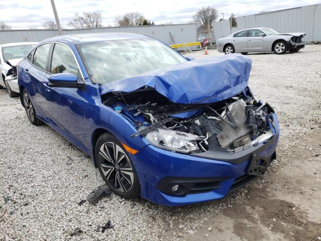 Photo 1 from auction – 2018 HONDA CIVIC EX with VIN JHMFC1F3XJX035337