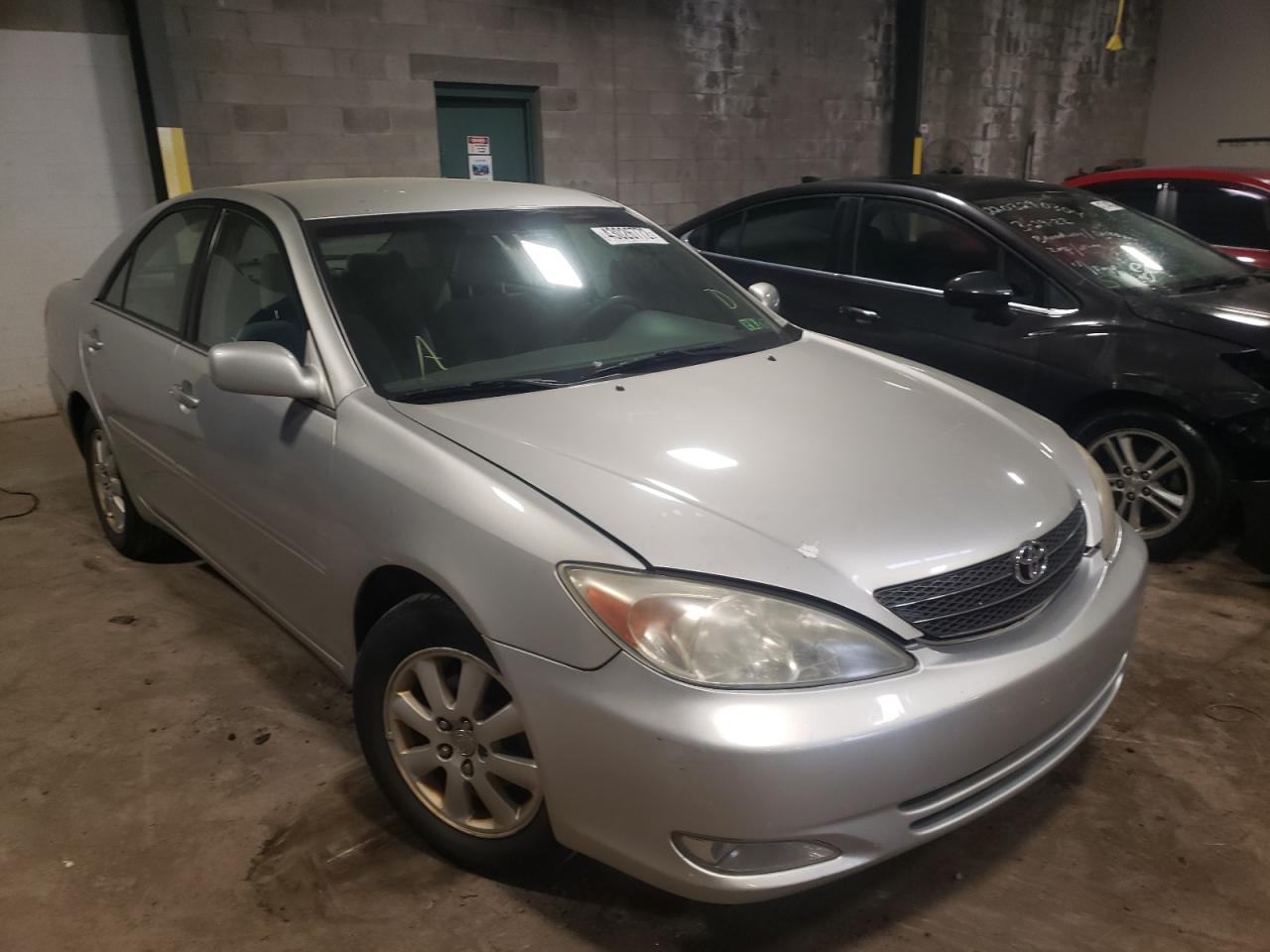 TOYOTA CAMRY LE 2004 with VIN 4T1BE30KX4U800554 - Photo from auction