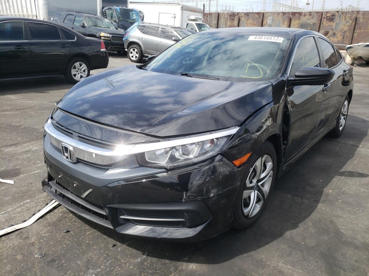 Photo 2 from auction – 2017 HONDA CIVIC LX with VIN 2HGFC2F54HH553887