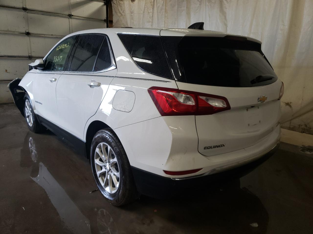 Photo 3 from auction – 2018 CHEVROLET EQUINOX LT with VIN 3GNAXSEV3JS620620