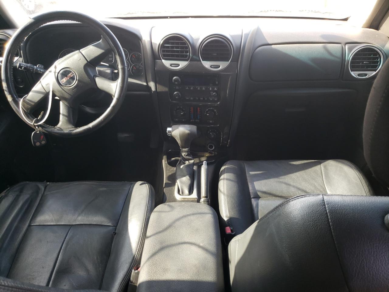 Photo 9 from auction – 2008 GMC ENVOY with VIN 1GKDS13S482181011