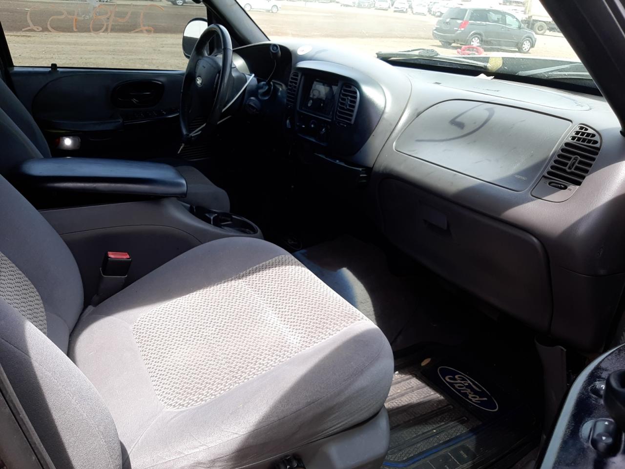 Photo 5 from auction – 2003 FORD F150 SUPER with VIN 1FTRW08L73KA58328
