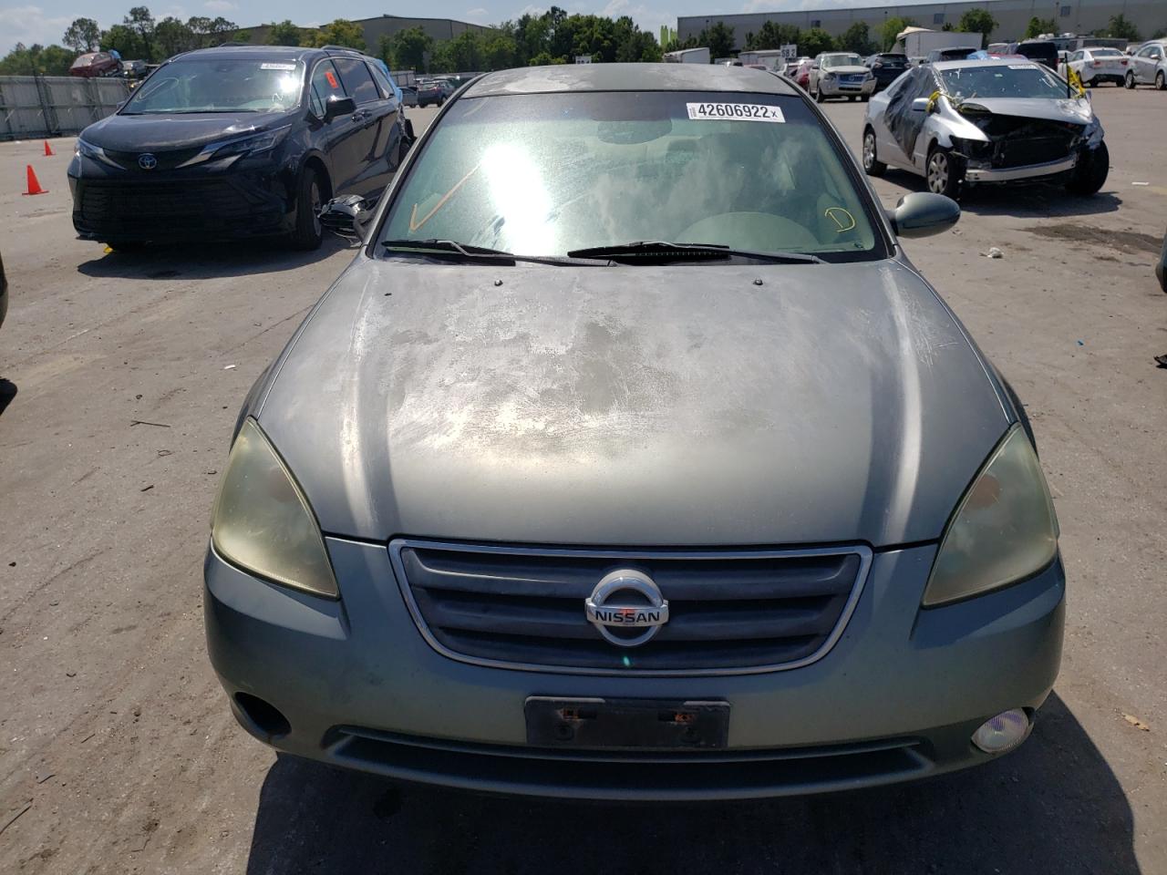 Photo 9 from auction – 2003 NISSAN ALTIMA BAS with VIN 1N4AL11E73C294016
