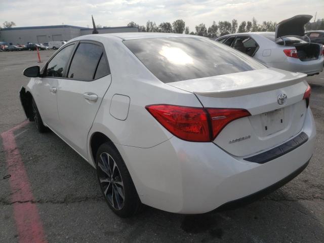 Photo 3 from auction – 2018 TOYOTA COROLLA L with VIN 5YFBURHEXJP802922