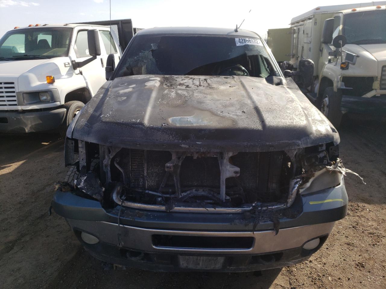 Photo 9 from auction – 2011 GMC SIERRA K35 with VIN 1GT424C88BF128796