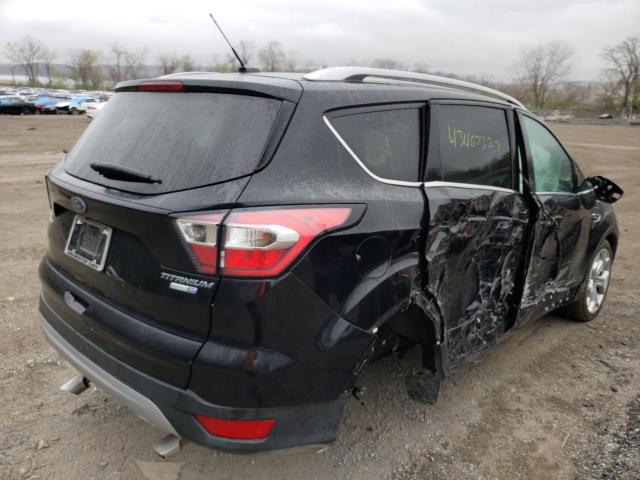 Photo 4 from auction – 2017 FORD ESCAPE TIT with VIN 1FMCU9J96HUC70983