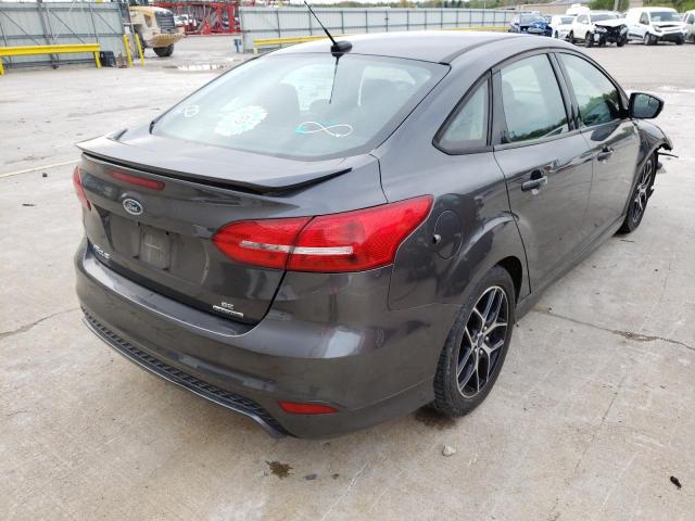 Photo 4 from auction – 2015 FORD FOCUS SE with VIN 1FADP3F23FL280310
