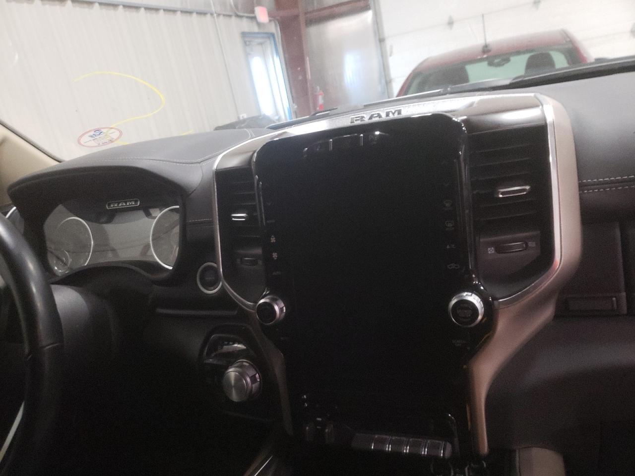 Photo 9 from auction – 2021 RAM 1500 LARAM with VIN 1C6SRFJT8MN677338