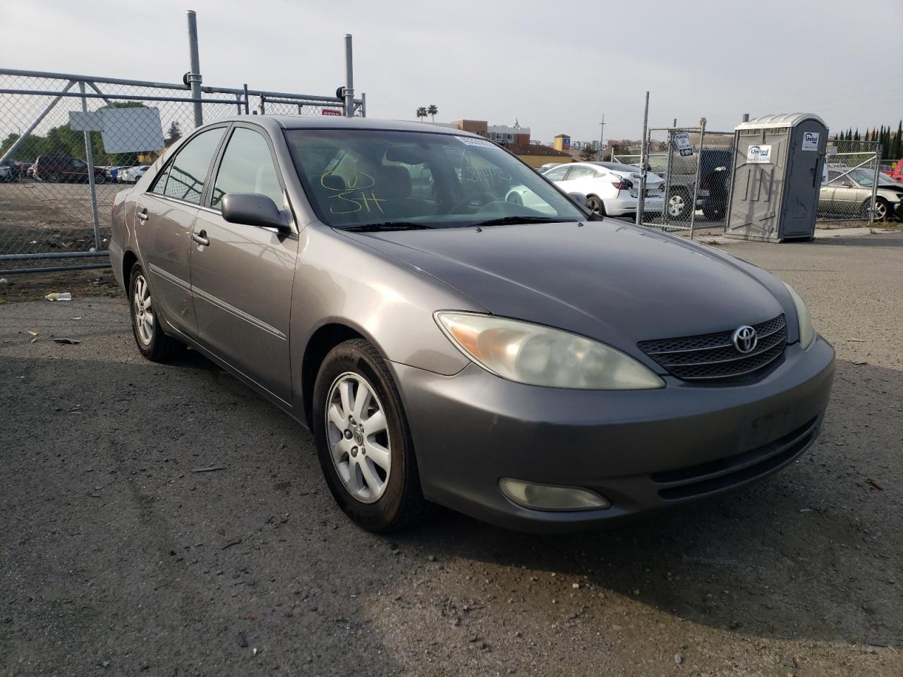 TOYOTA CAMRY LE 2004 with VIN 4T1BE32K64U878617 - Photo from auction