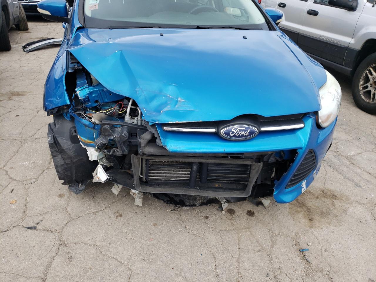Photo 9 from auction – 2013 FORD FOCUS SE with VIN 1FADP3F27DL218115