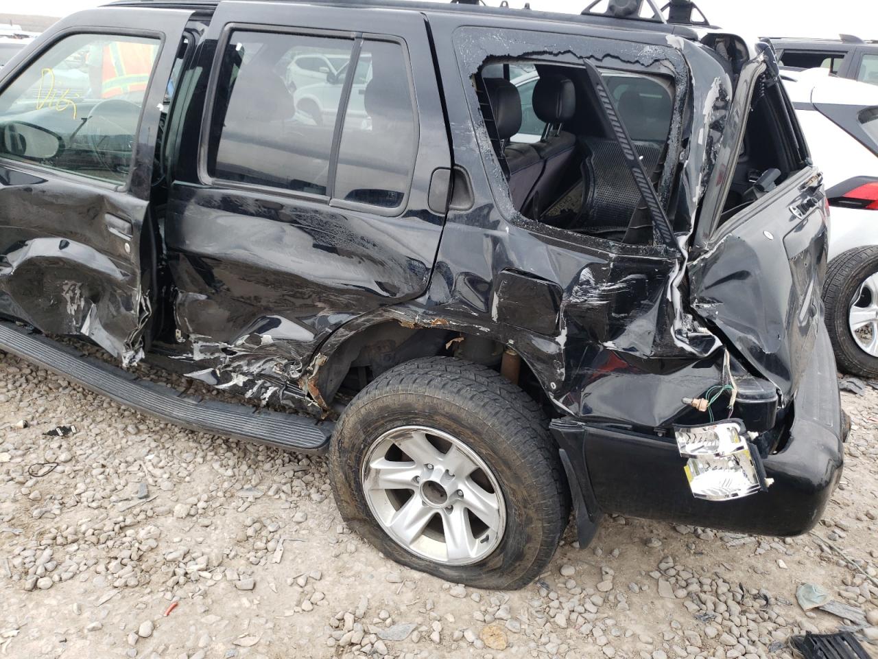 Photo 9 from auction – 2002 NISSAN PATHFINDER with VIN JN8DR09Y62W709505