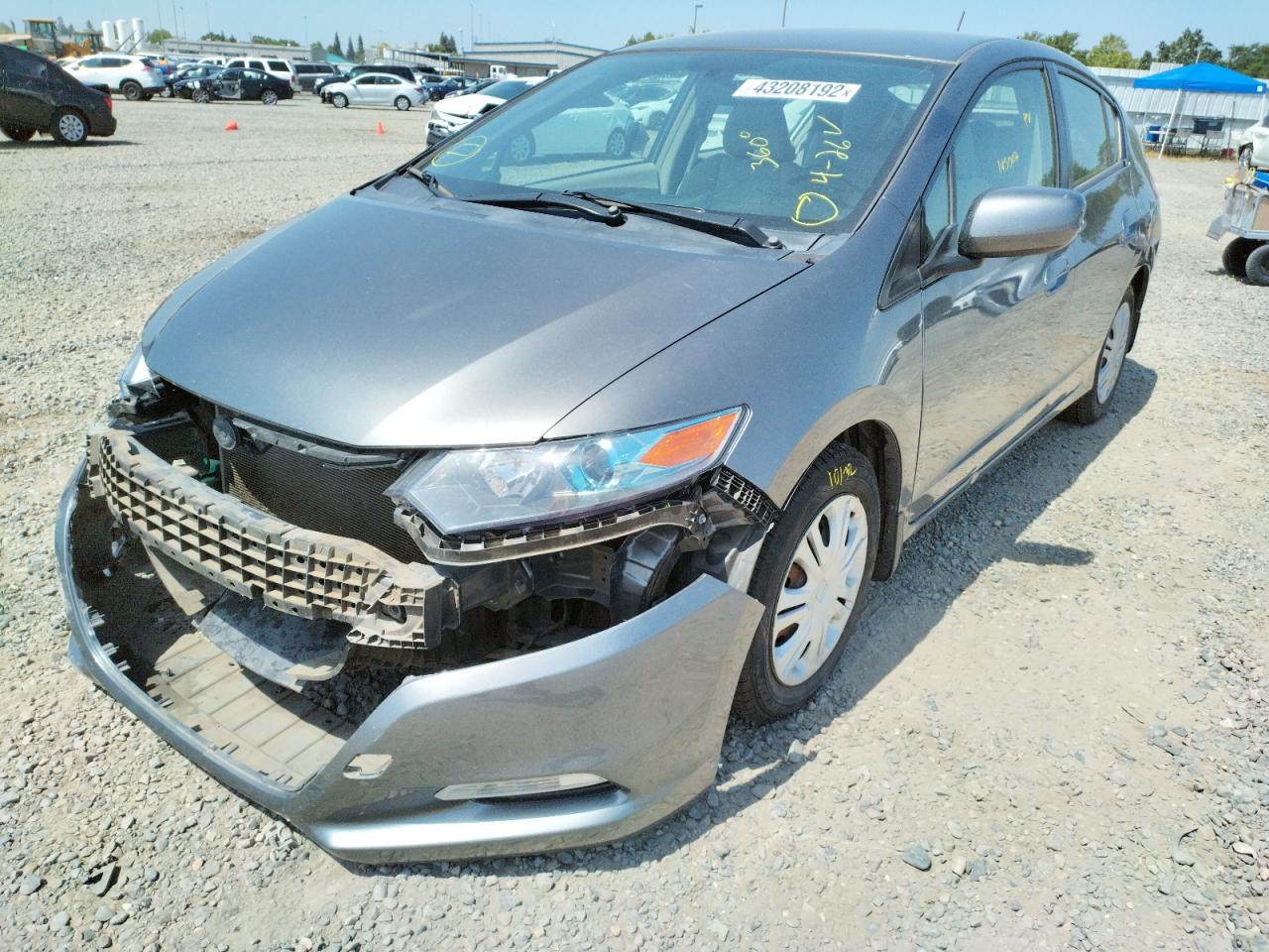 Photo 2 from auction – 2011 HONDA INSIGHT LX with VIN JHMZE2H56BS002586