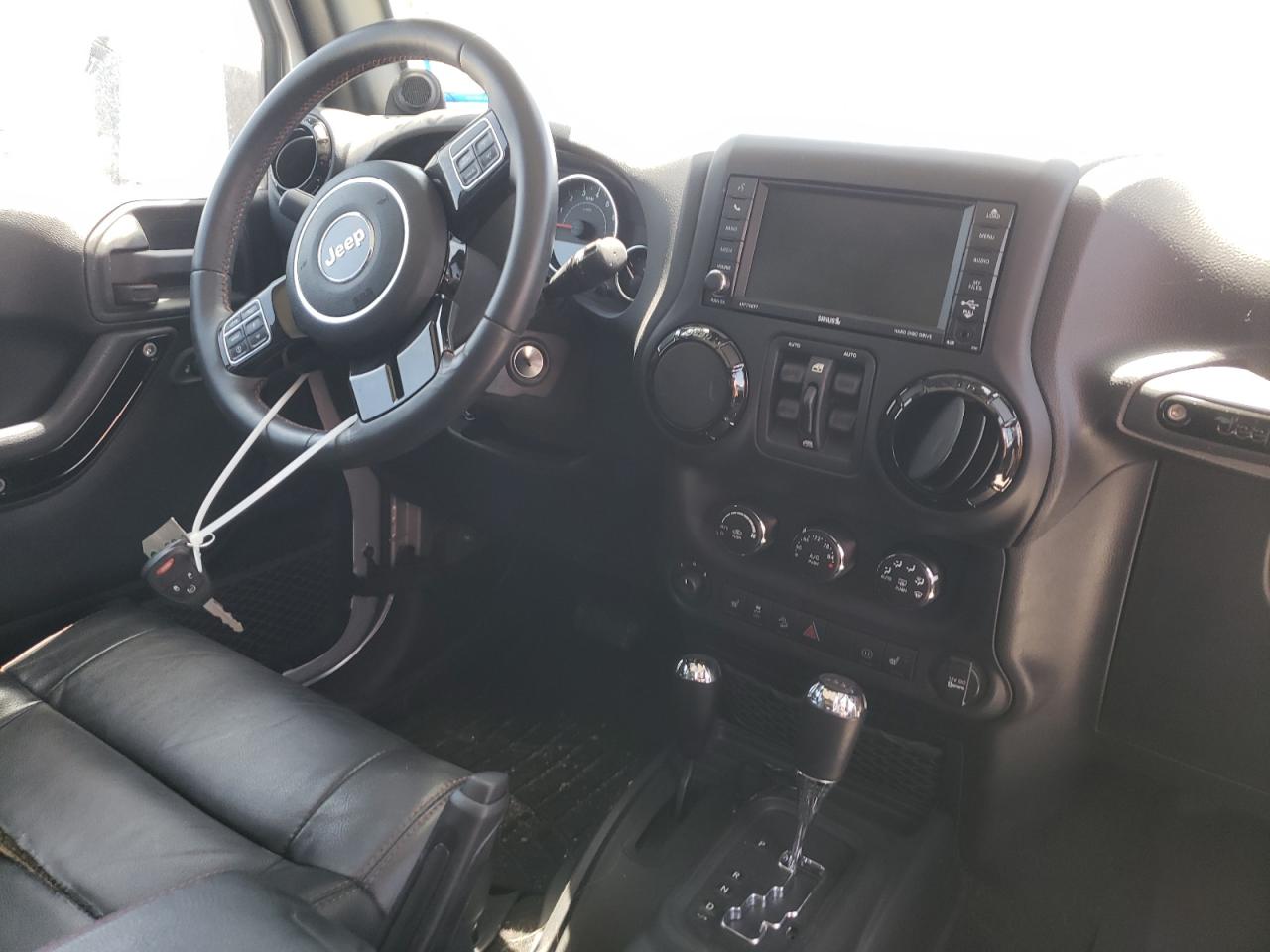 Photo 9 from auction – 2012 JEEP WRANGLER U with VIN 1C4HJWEG9CL254737