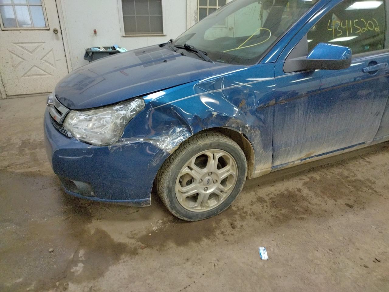 Photo 10 from auction – 2009 FORD FOCUS SES with VIN 1FAHP36N99W253191