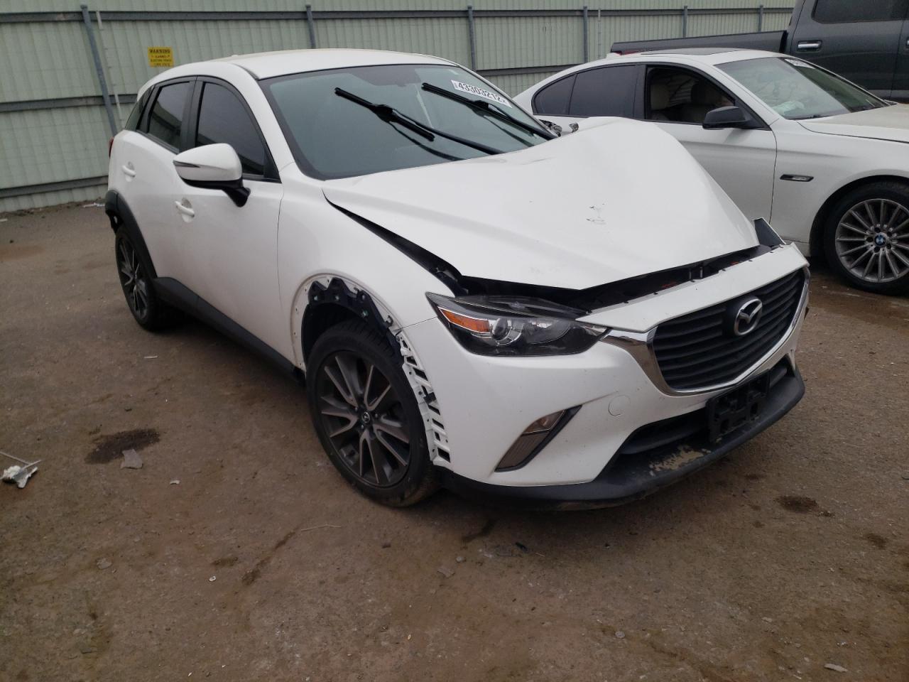 MAZDA CX-3 TOURI 2017 with VIN JM1DKFC7XH0173561 - Photo from auction