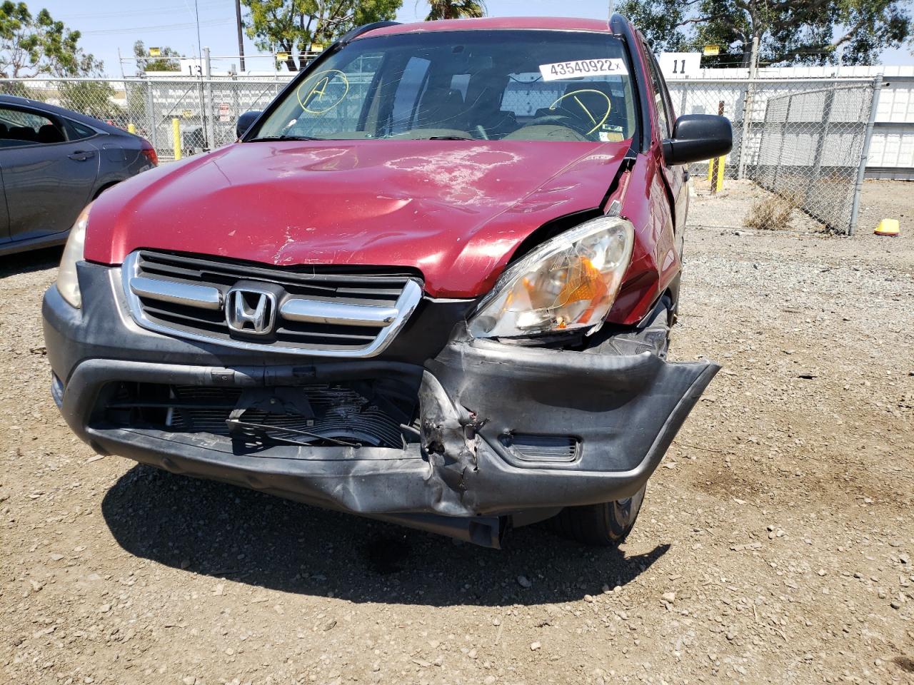 Photo 9 from auction – 2004 HONDA CR-V LX with VIN JHLRD68474C022347