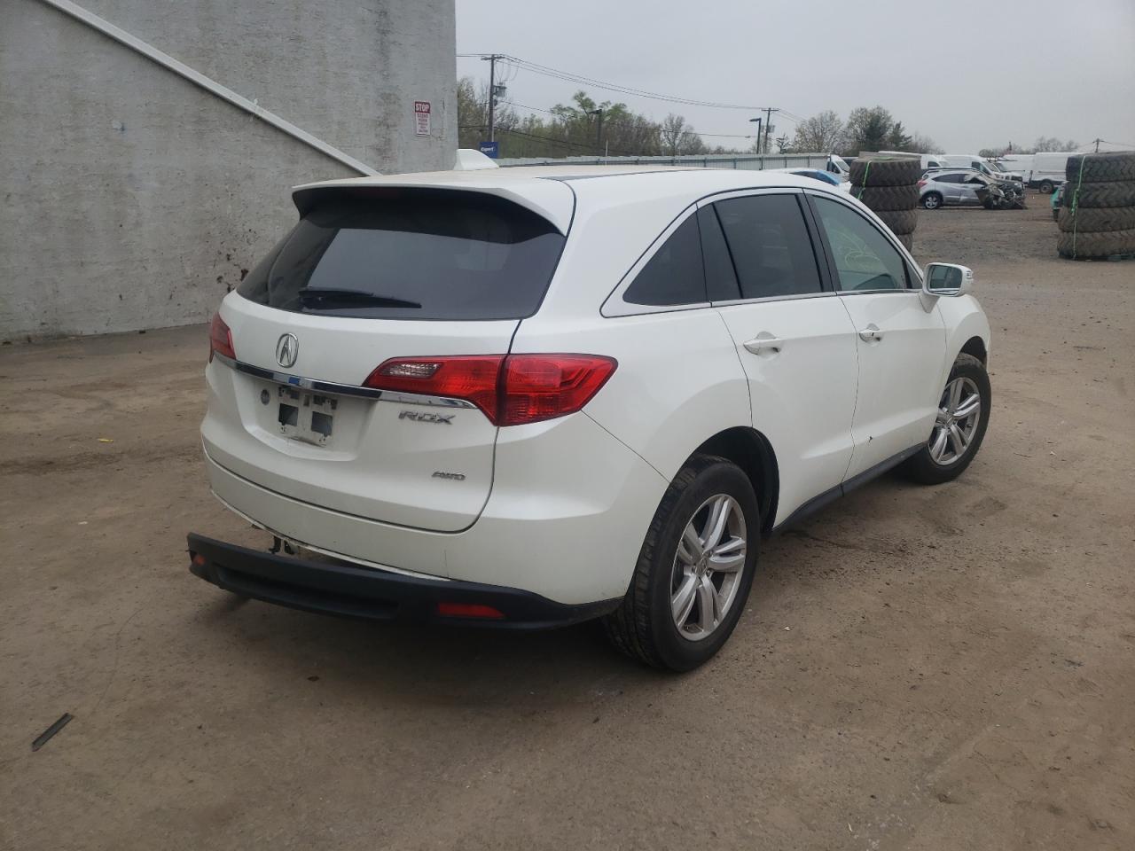 Photo 4 from auction – 2015 ACURA 1.6EL PREM with VIN 5J8TB4H39FL012623