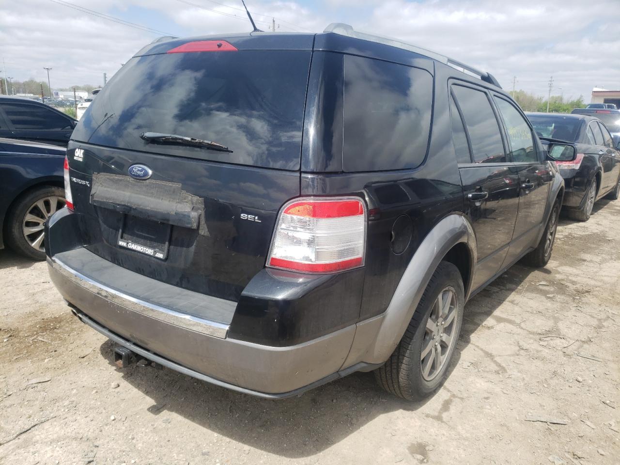 Photo 4 from auction – 2009 FORD TAURUS X S with VIN 1FMDK02W69GA06351
