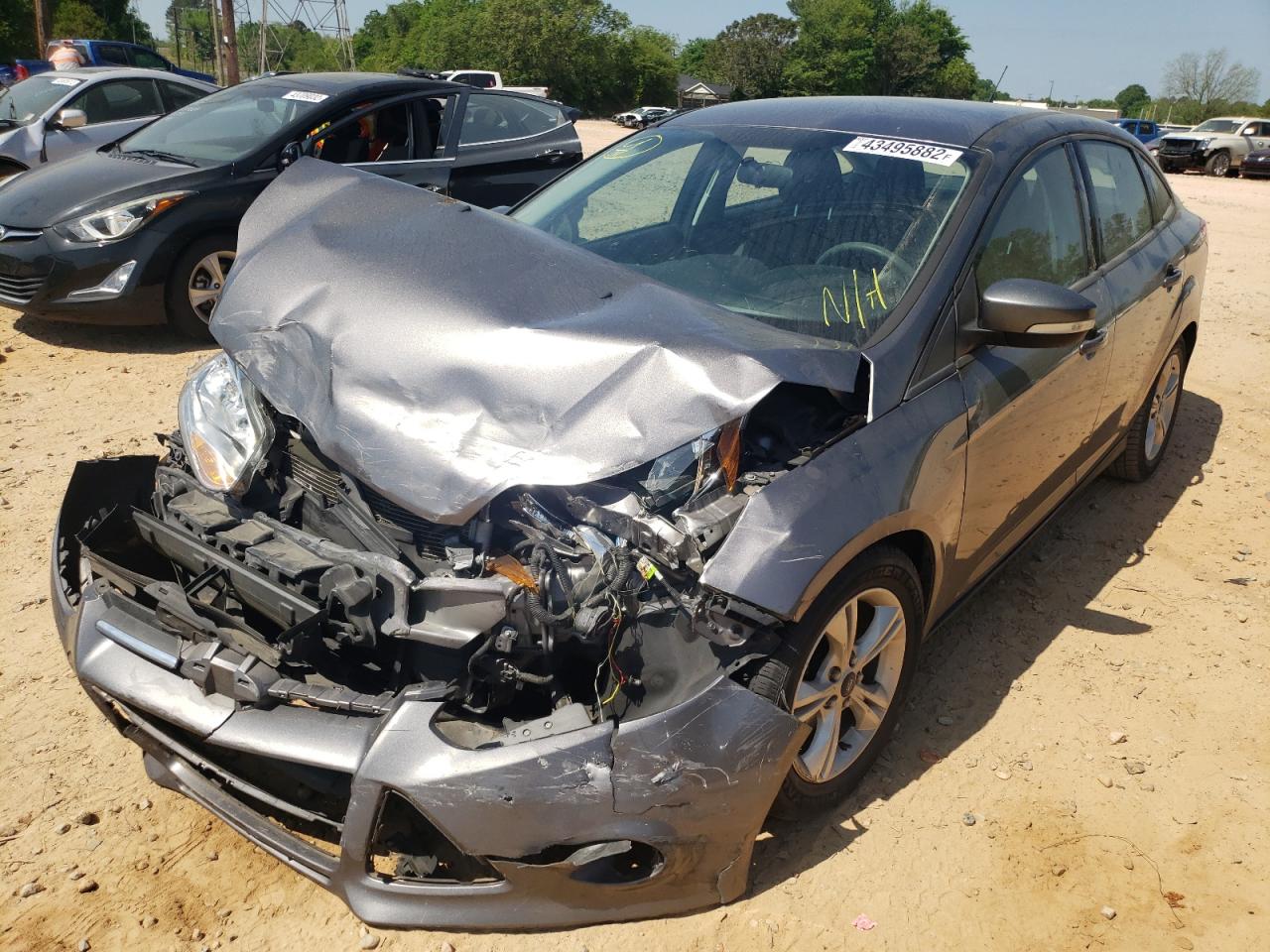 Photo 2 from auction – 2014 FORD FOCUS SE with VIN 1FADP3F22EL379022