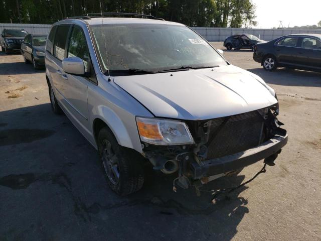 DODGE GRAND CARA 2010 with VIN 2D4RN5D11AR209895 - Photo from auction