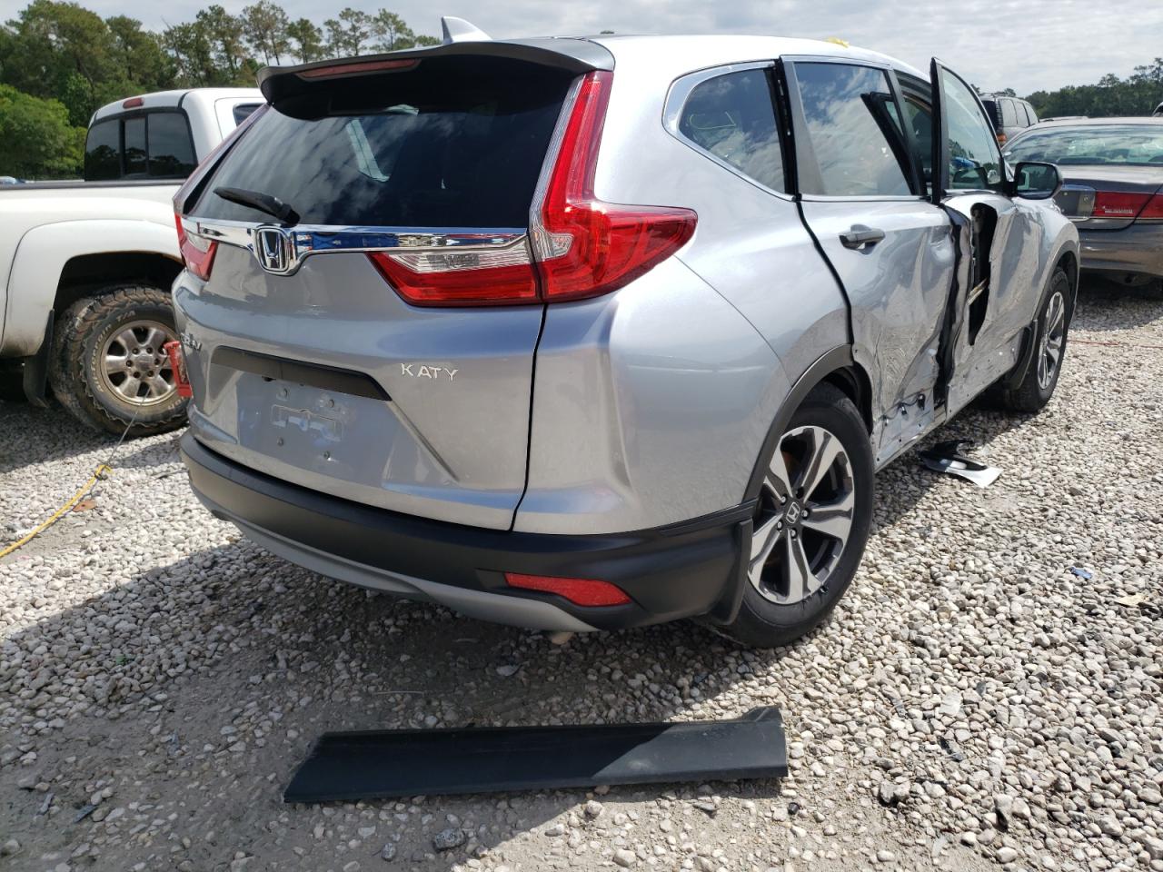 Photo 4 from auction – 2017 HONDA CR-V LX with VIN 7FARW5H36HE010003