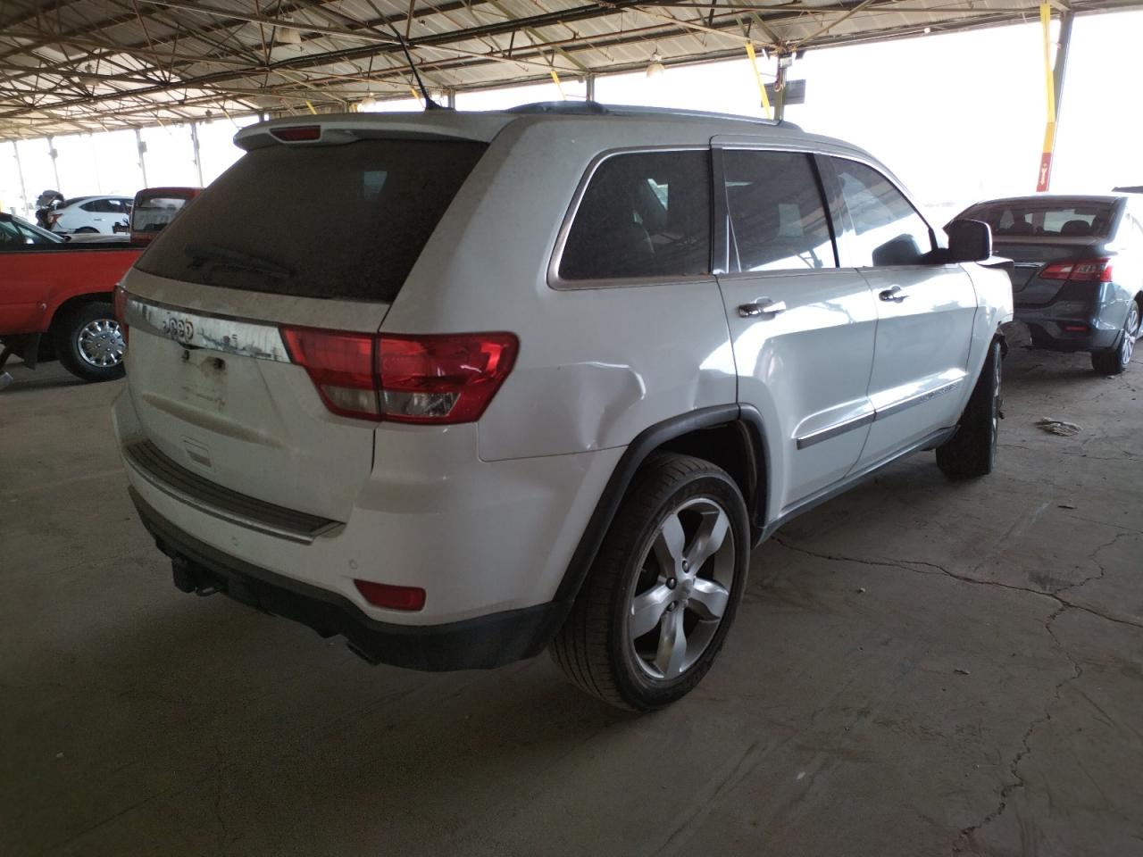 Photo 4 from auction – 2013 JEEP GRAND CHER with VIN 1C4RJECT4DC600726