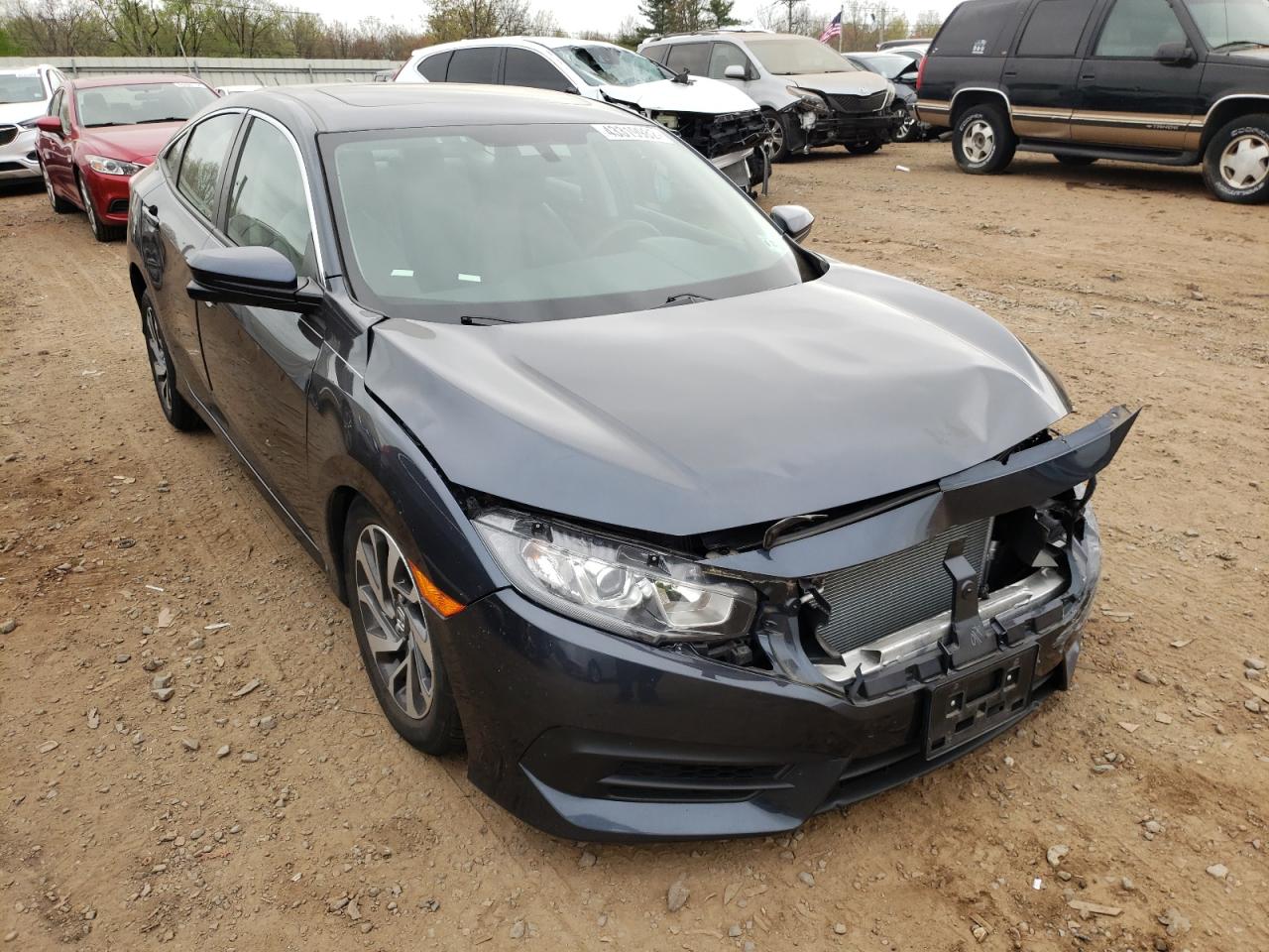 HONDA CIVIC EX 2018 with VIN 2HGFC2F75JH571693 - Photo from auction