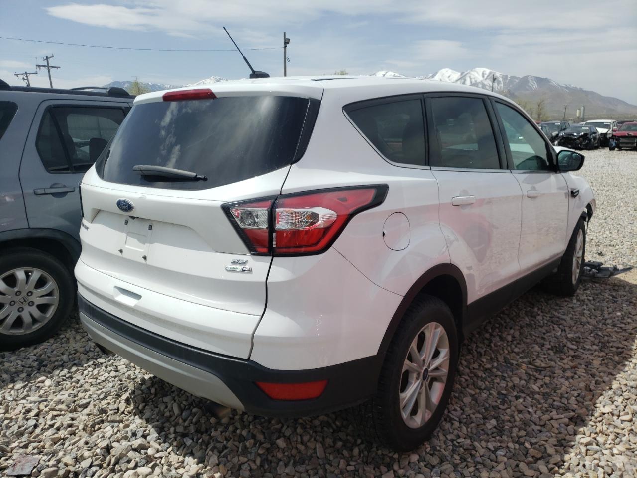 Photo 4 from auction – 2017 FORD ESCAPE SE with VIN 1FMCU9GD5HUE39323