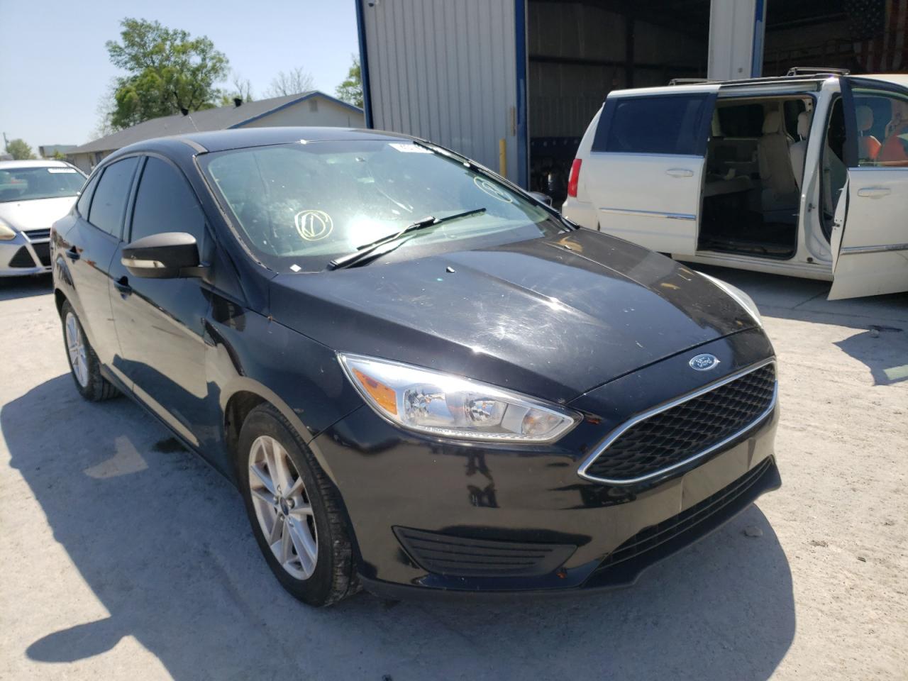 FORD FOCUS SE 2016 with VIN 1FADP3F22GL264603 - Photo from auction