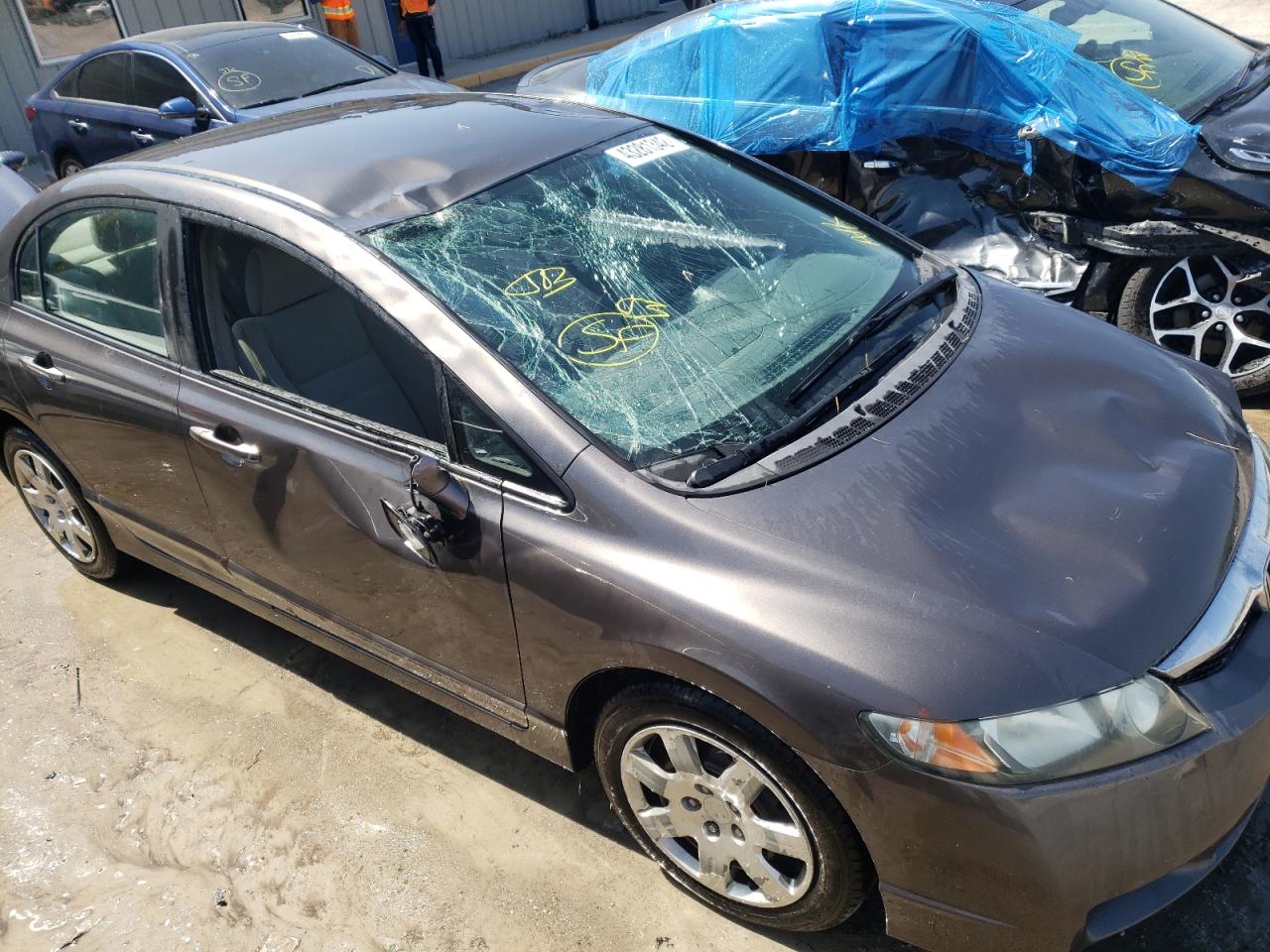 Photo 9 from auction – 2010 HONDA CIVIC LX with VIN 19XFA1F50AE044010