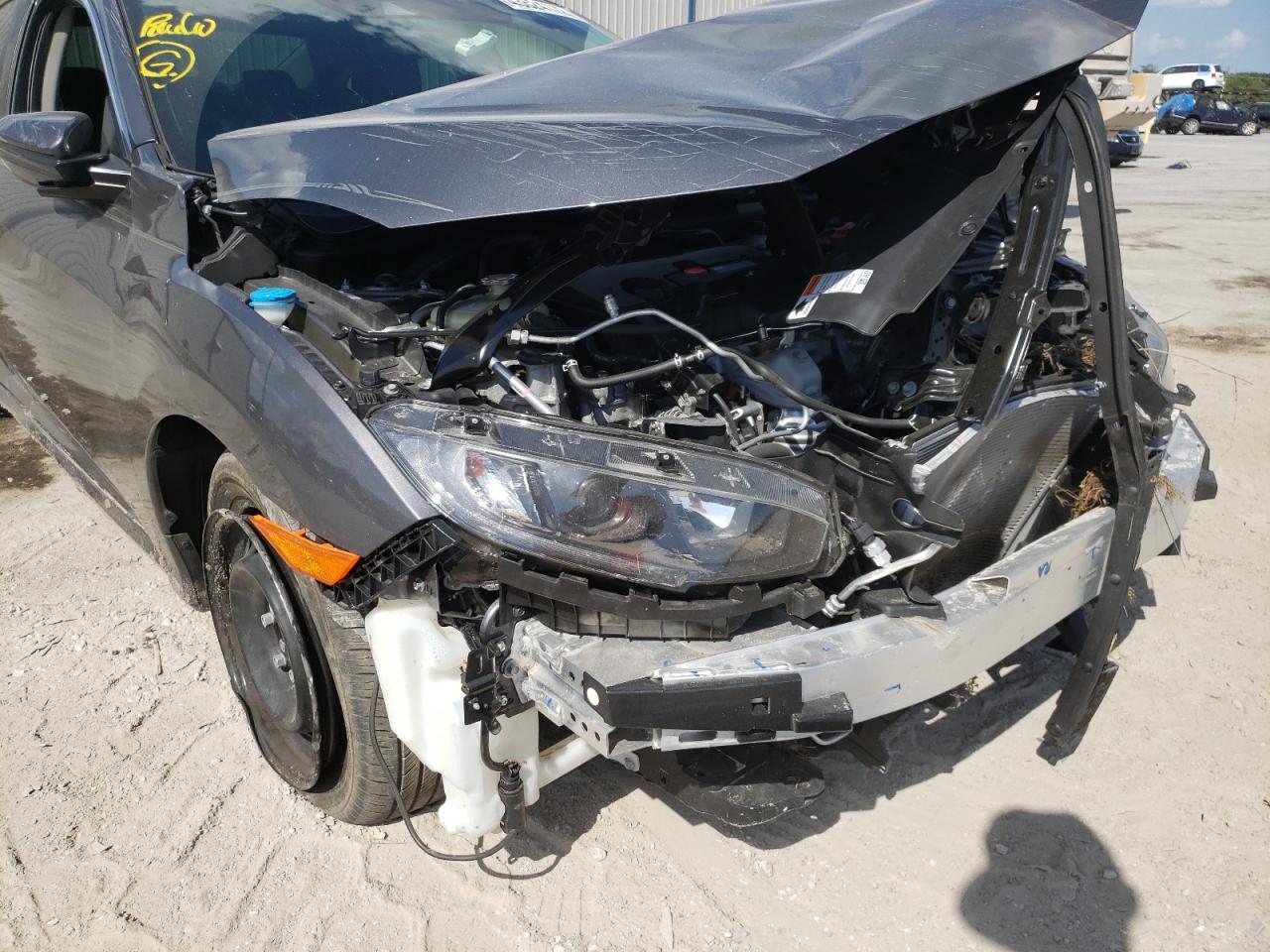 Photo 9 from auction – 2021 HONDA CIVIC LX with VIN 2HGFC2F6XMH551306
